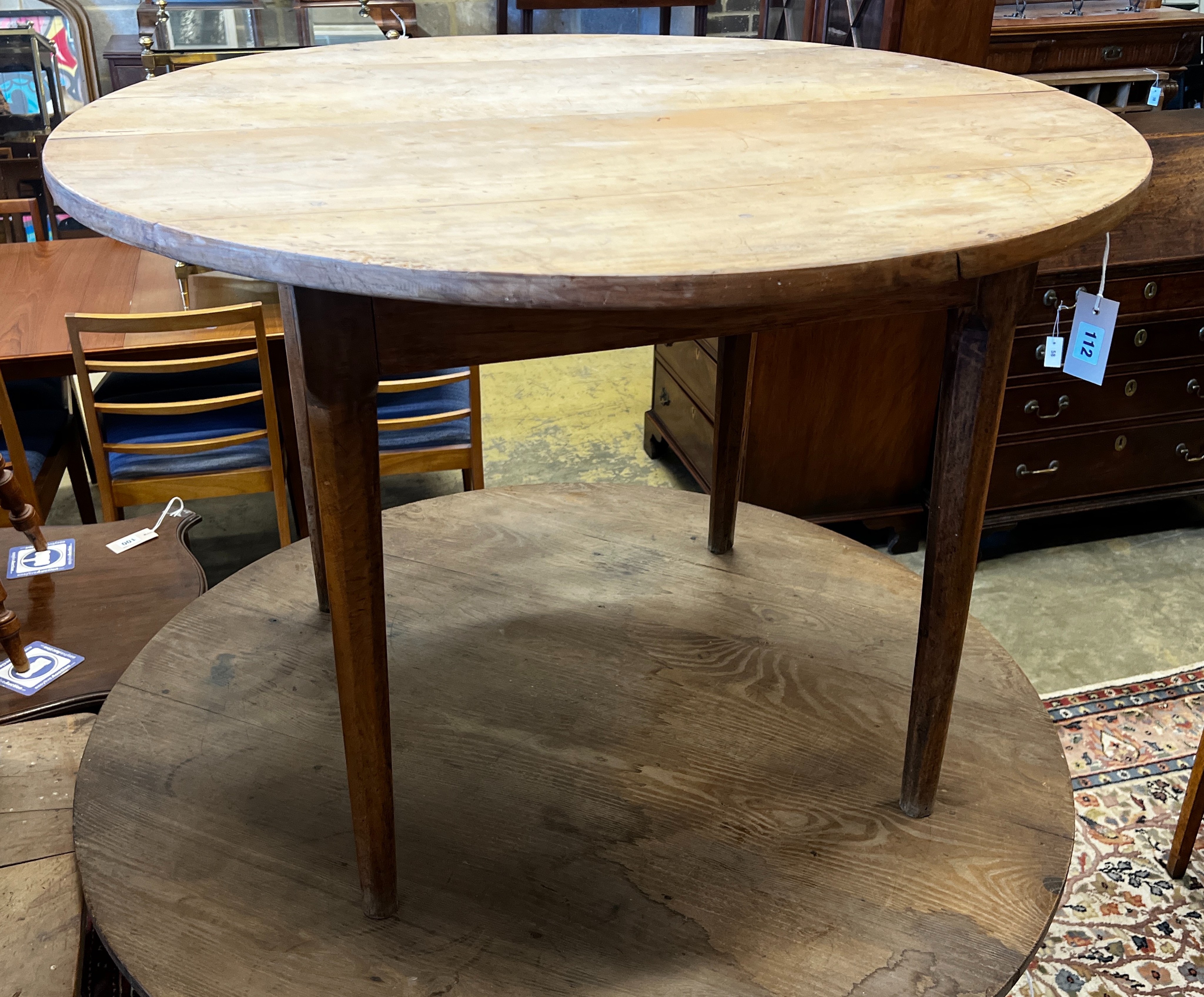 A 19th century French cherrywood circular table, diameter 100cm, height 71cm